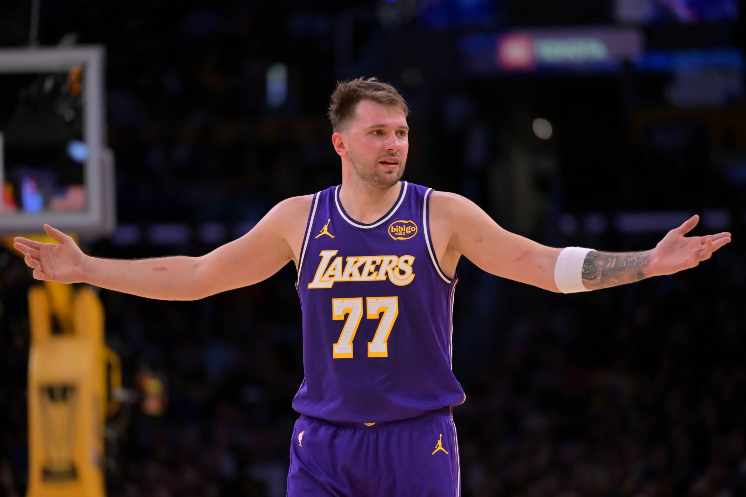 Los Angeles Lakers guard Luka Doncic (77) reacts after a foul on Dallas Mavericks forward Naji Marshall (13) in the second half at Crypto.com Arena.
