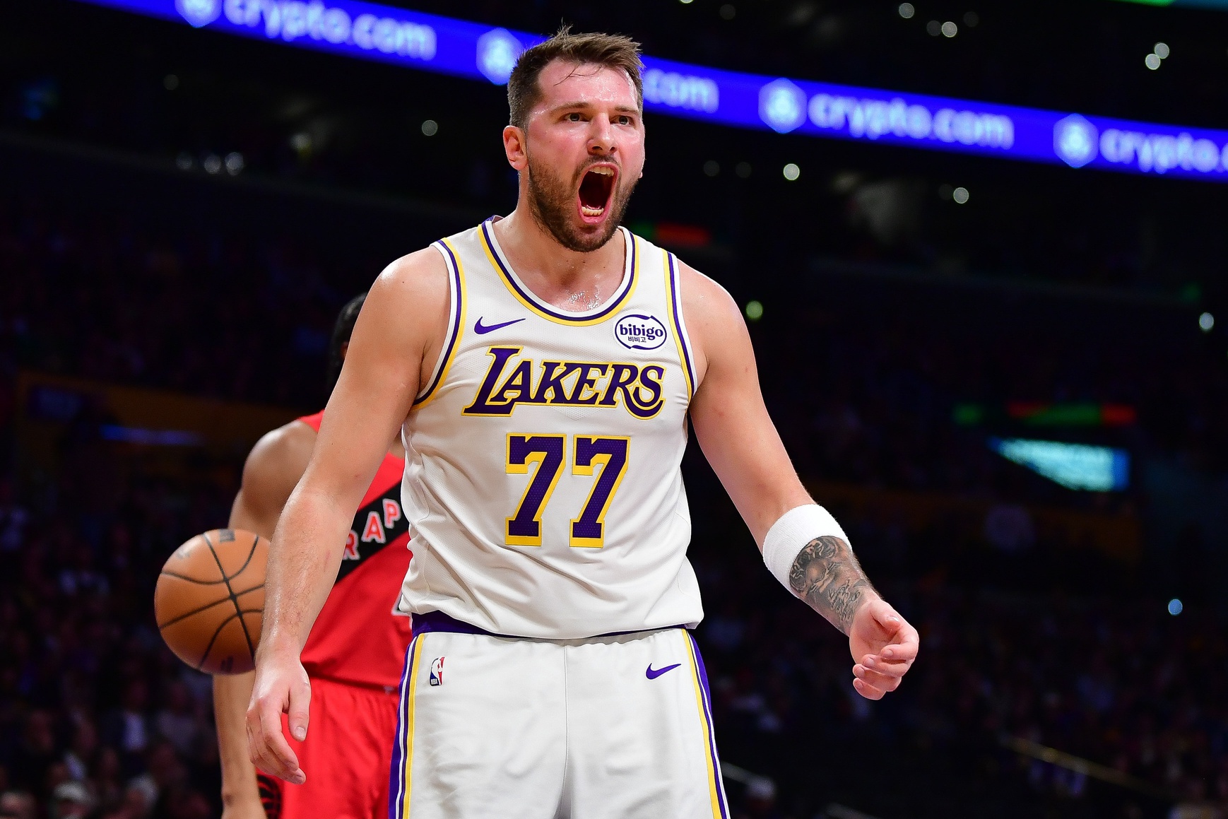Los Angeles Lakers guard Luka Doncic (77) reacts during the first half at Crypto.com Arena.