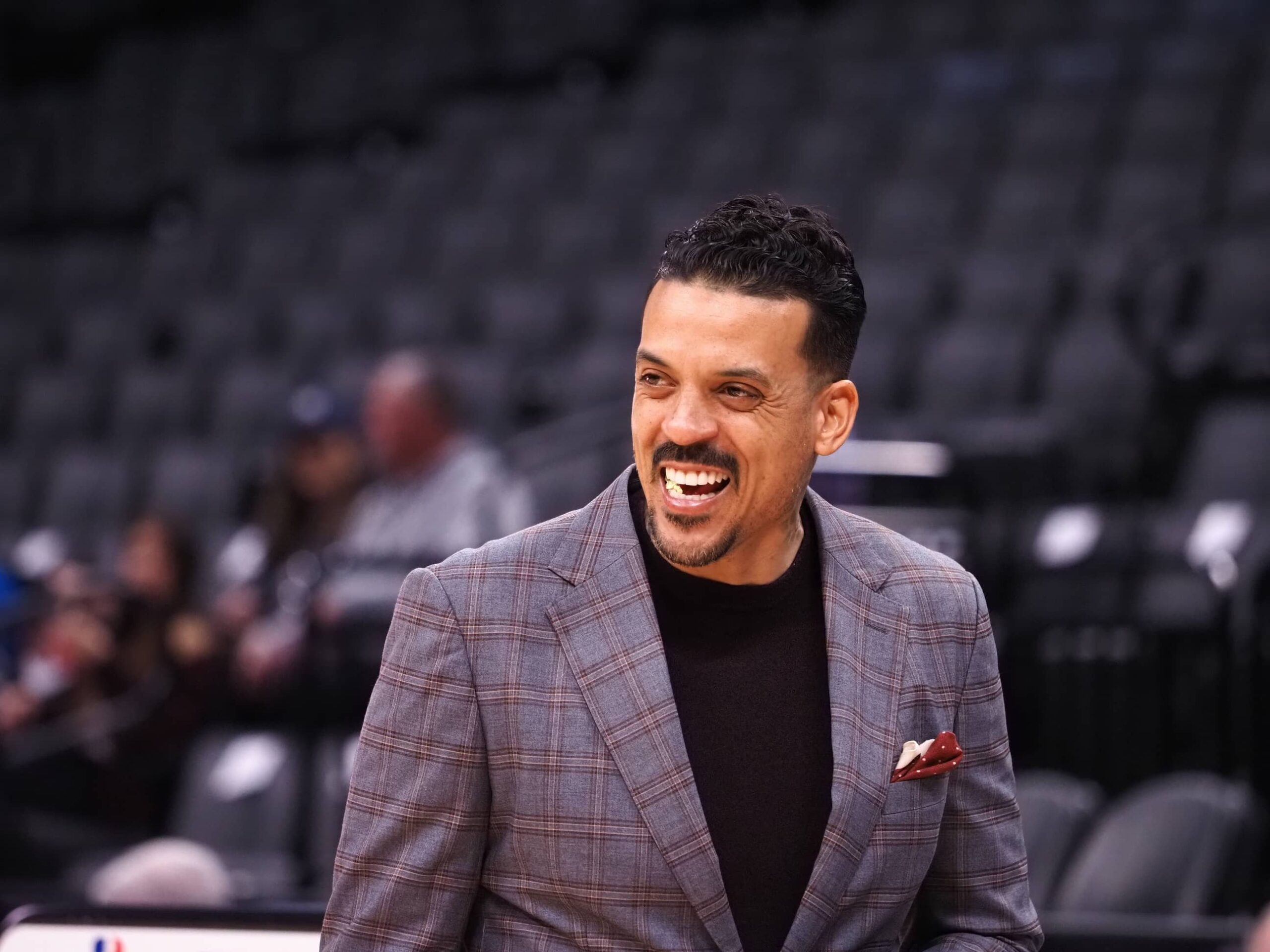 Former NBA player Matt Barnes smiles on the court before the game between the Sacramento Kings and New York Knicks at Golden 1 Center.