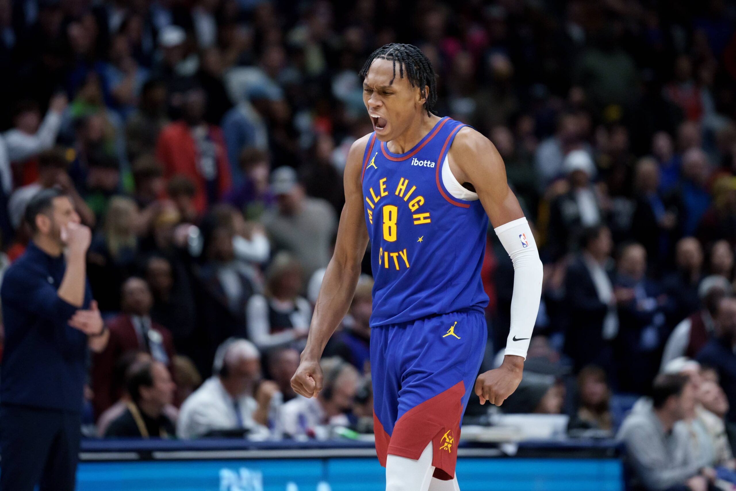 Denver Nuggets guard Peyton Watson (8) reacts to making a basket against the New Orleans Pelicans during the fourth quarter at Smoothie King Center.
