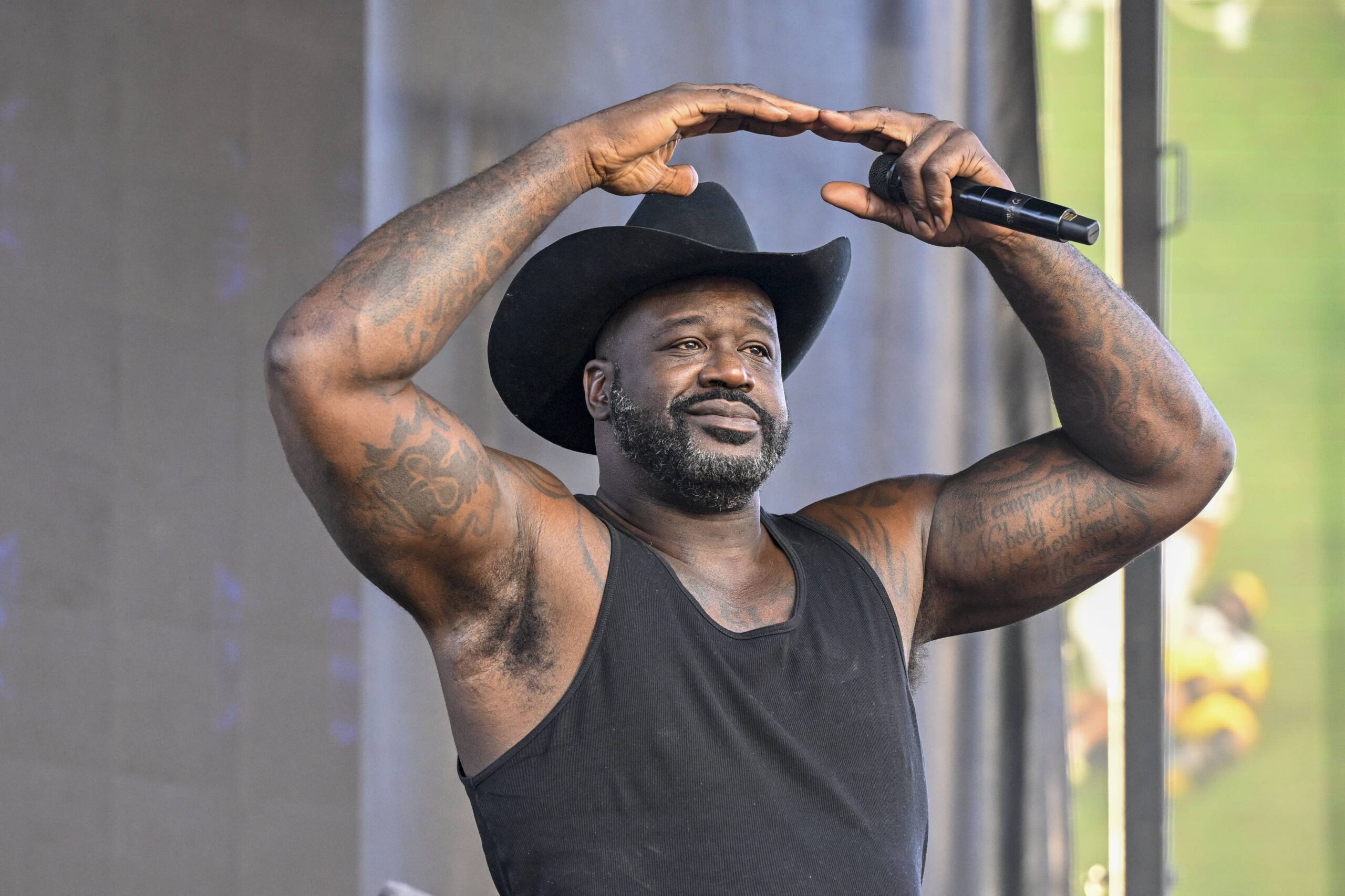Shaquille O'Neal, also known as DJ Diesel, performs before the 2025 Cotton Bowl and quarterfinal game of the College Football Playoff at AT&T Stadium.
