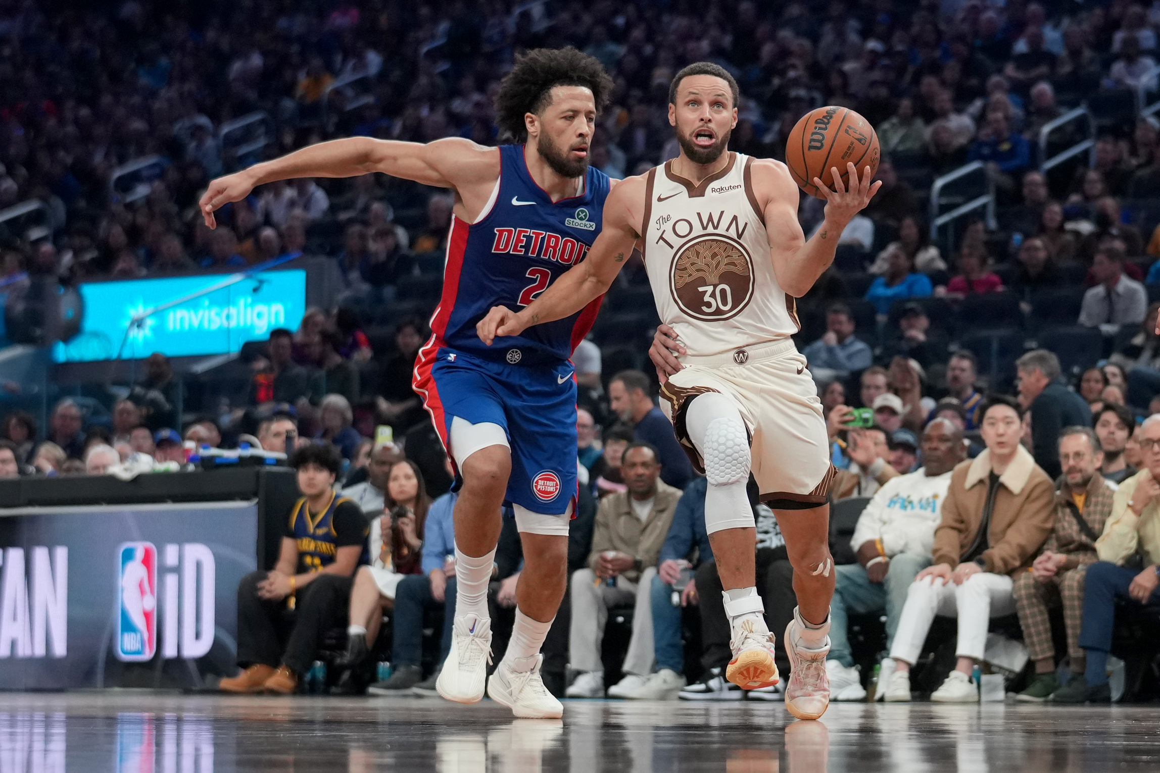 Jan 30, 2026; San Francisco, California, USA; Golden State Warriors guard Stephen Curry (30) drives against Detroit Pistons guard Cade Cunningham (2) in the third quarter at the Chase Center. Mandatory Credit: Cary Edmondson-Imagn Images