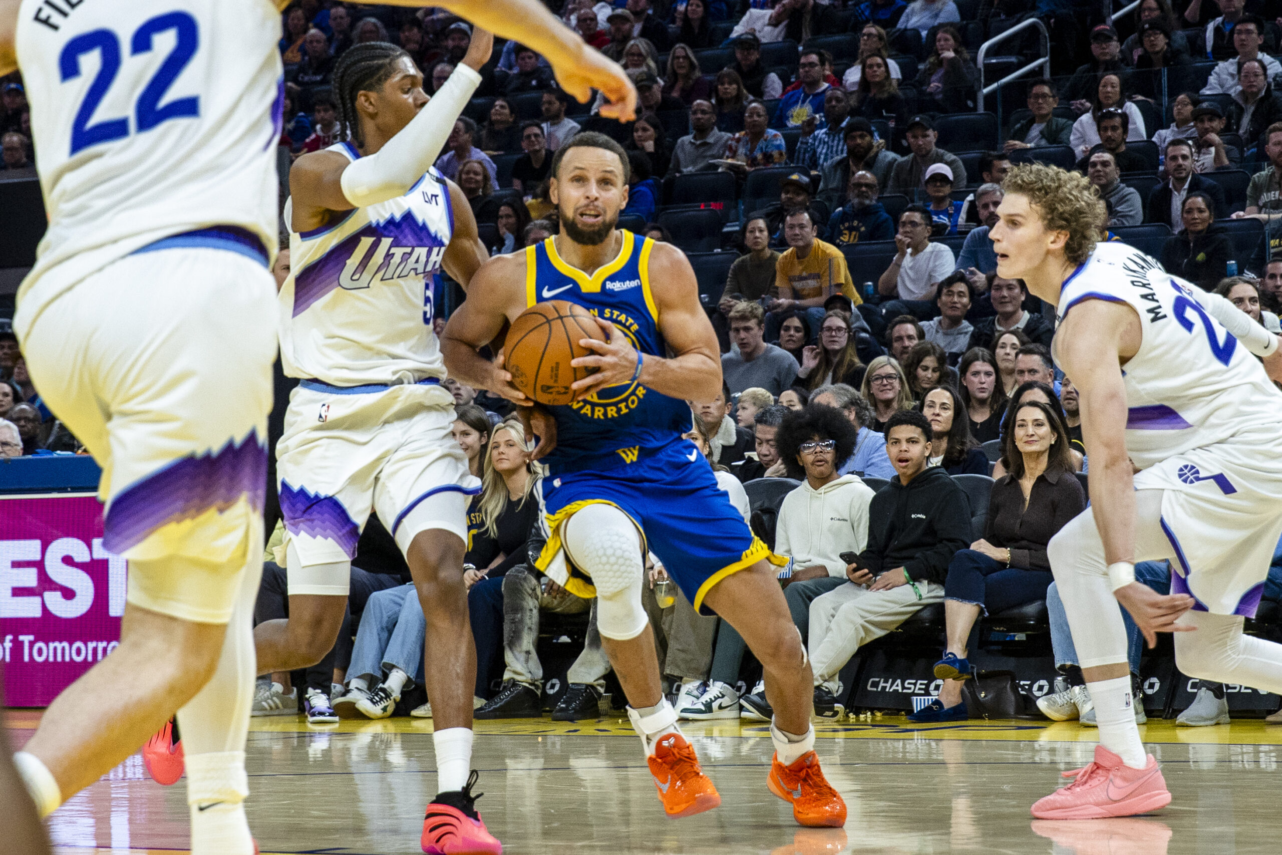 Jan 3, 2026; San Francisco, California, USA; Golden State Warriors guard Stephen Curry (30) drives past Utah Jazz forward Cody Williams (5) during the second quarter at Chase Center. Mandatory Credit: John Hefti-Imagn Images