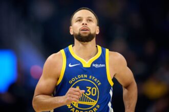 Golden State Warriors guard Stephen Curry (30) runs back on defense against the Minnesota Timberwolves during the first quarter at Chase Center.