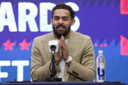 Washington, District of Columbia, USA; Newly acquired Washington Wizards guard Trae Young speaks at an introductory press conference prior to the Wizards' game against the New Orleans Pelicans at Capital One Arena. Mandatory Credit: Geoff Burke-Imagn Images