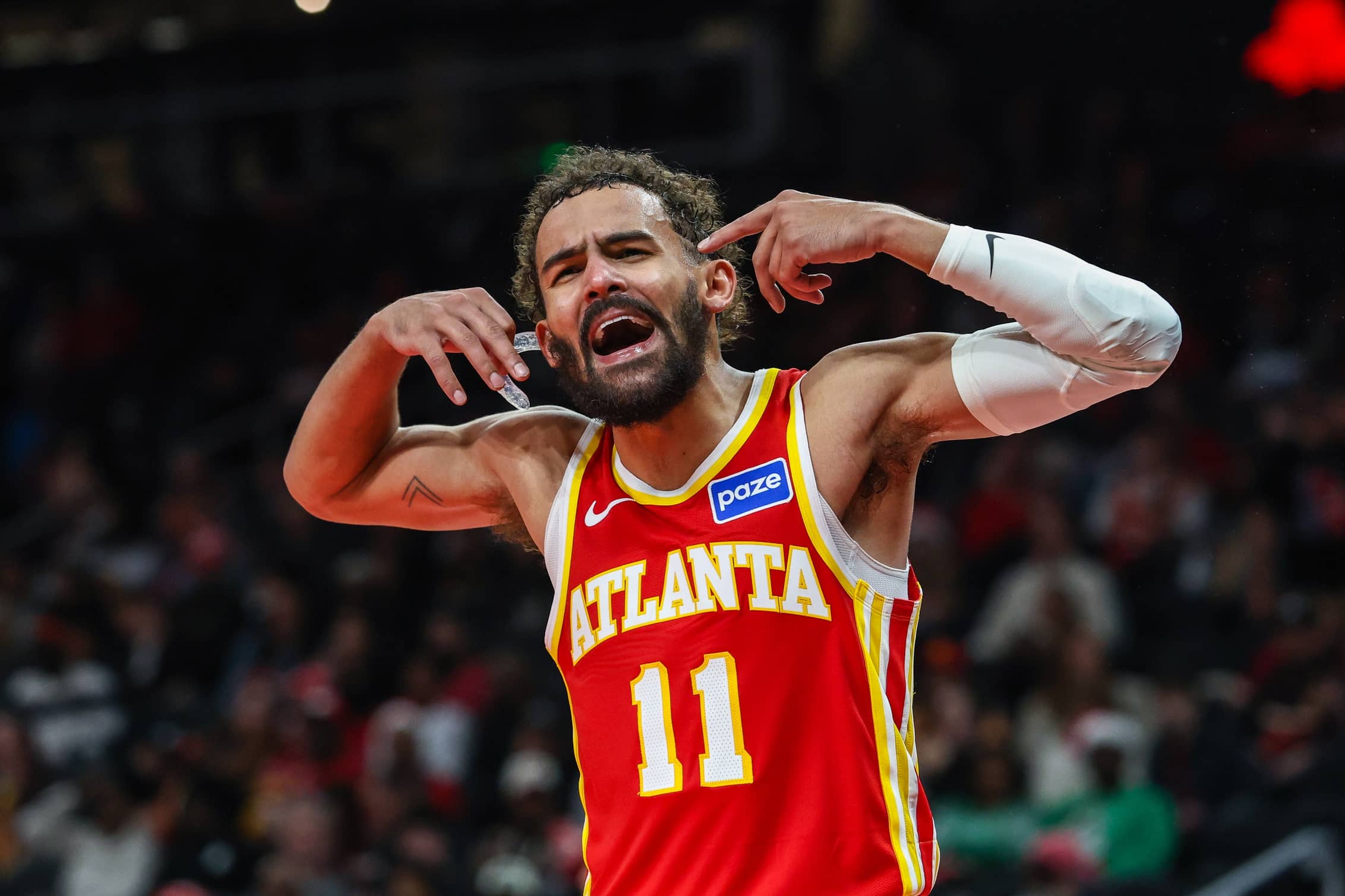 Dec 23, 2025; Atlanta, Georgia, USA; Atlanta Hawks guard Trae Young (11) yells at the referee during the game against the Chicago Bulls during the third quarter at State Farm Arena. Mandatory Credit: Jordan Godfree-Imagn Images