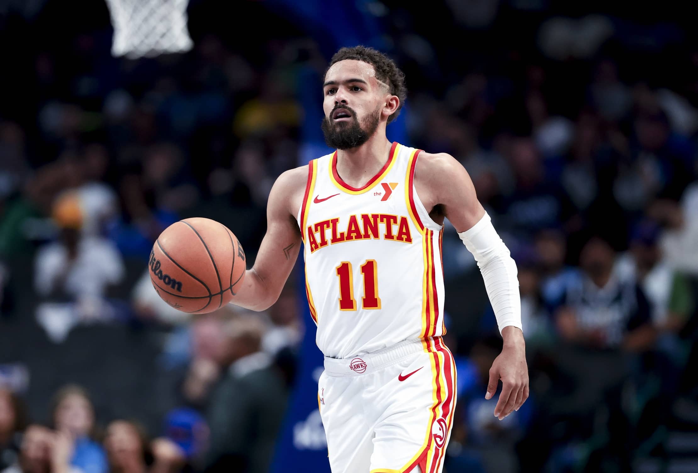 Apr 2, 2025; Dallas, Texas, USA; Atlanta Hawks guard Trae Young (11) dribbles against the Dallas Mavericks during the second half at American Airlines Center. Mandatory Credit: Kevin Jairaj-Imagn Images