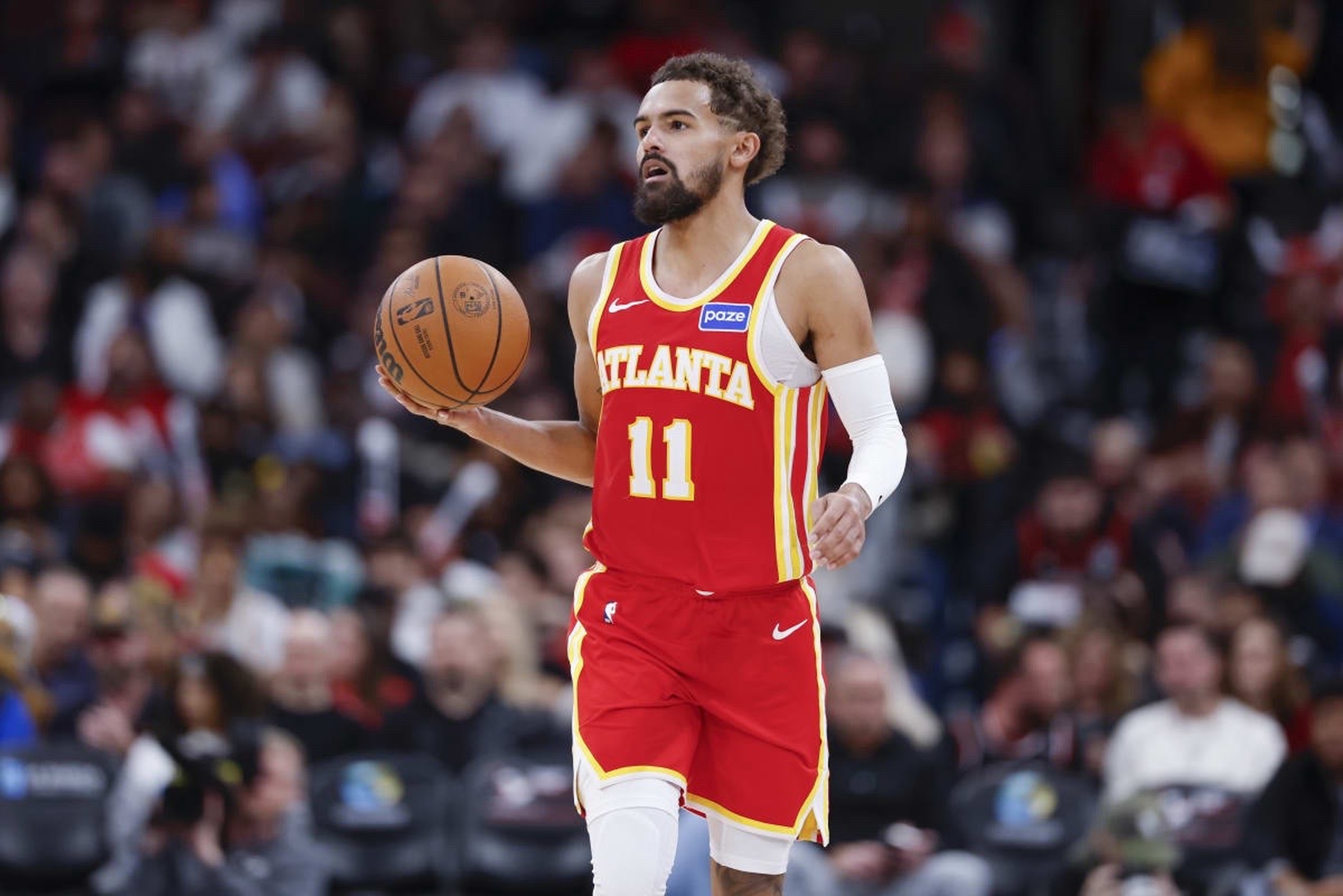 Oct 27, 2025; Chicago, Illinois, USA; Atlanta Hawks guard Trae Young (11) brings the ball up court against the Chicago Bulls during the second half at United Center. Mandatory Credit: Kamil Krzaczynski-Imagn Images