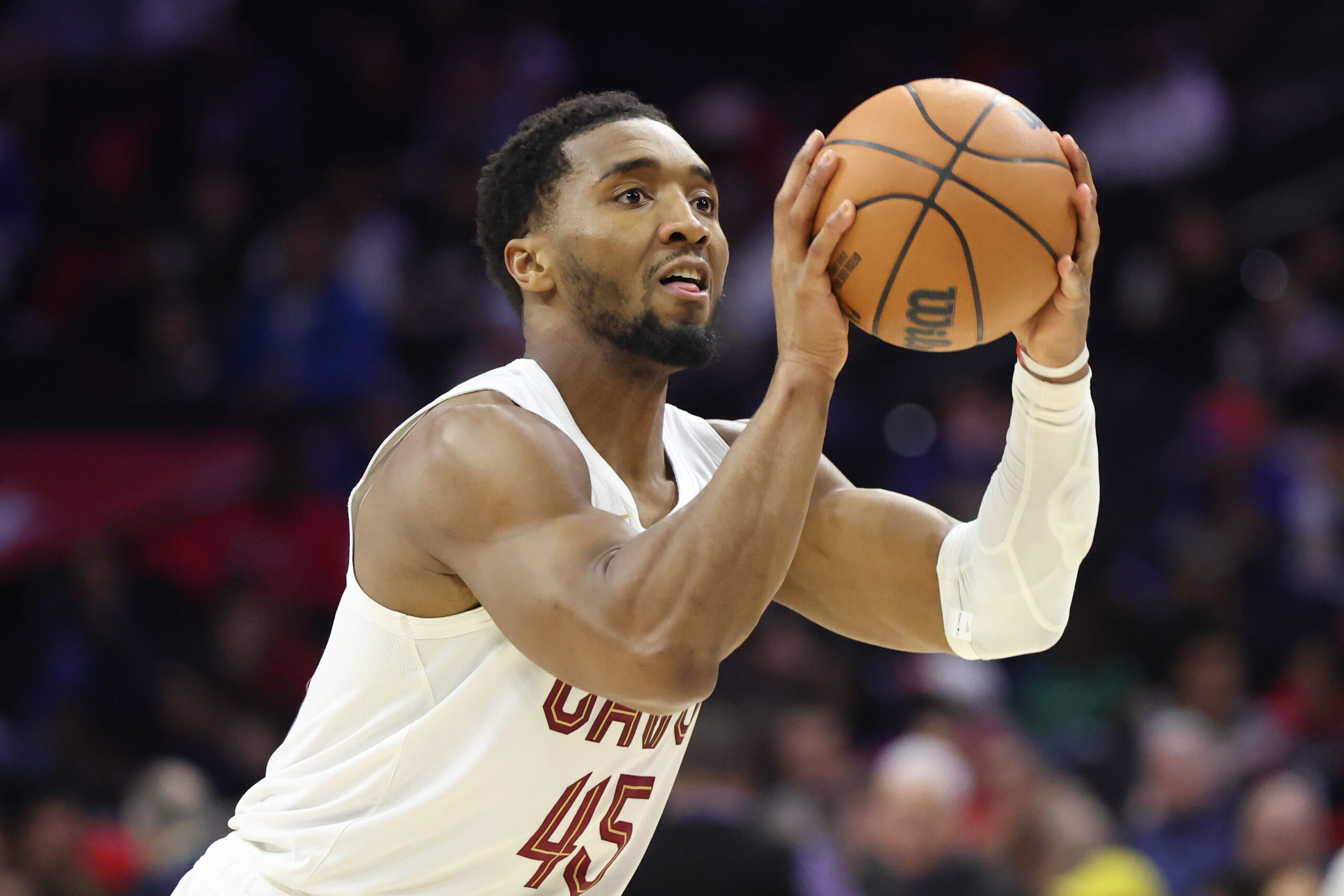 Jan 14, 2026; Philadelphia, Pennsylvania, USA; Cleveland Cavaliers guard Donovan Mitchell (45) shoots the ball against the Philadelphia 76ers during the third quarter at Xfinity Mobile Arena. Mandatory Credit: Bill Streicher-Imagn Images