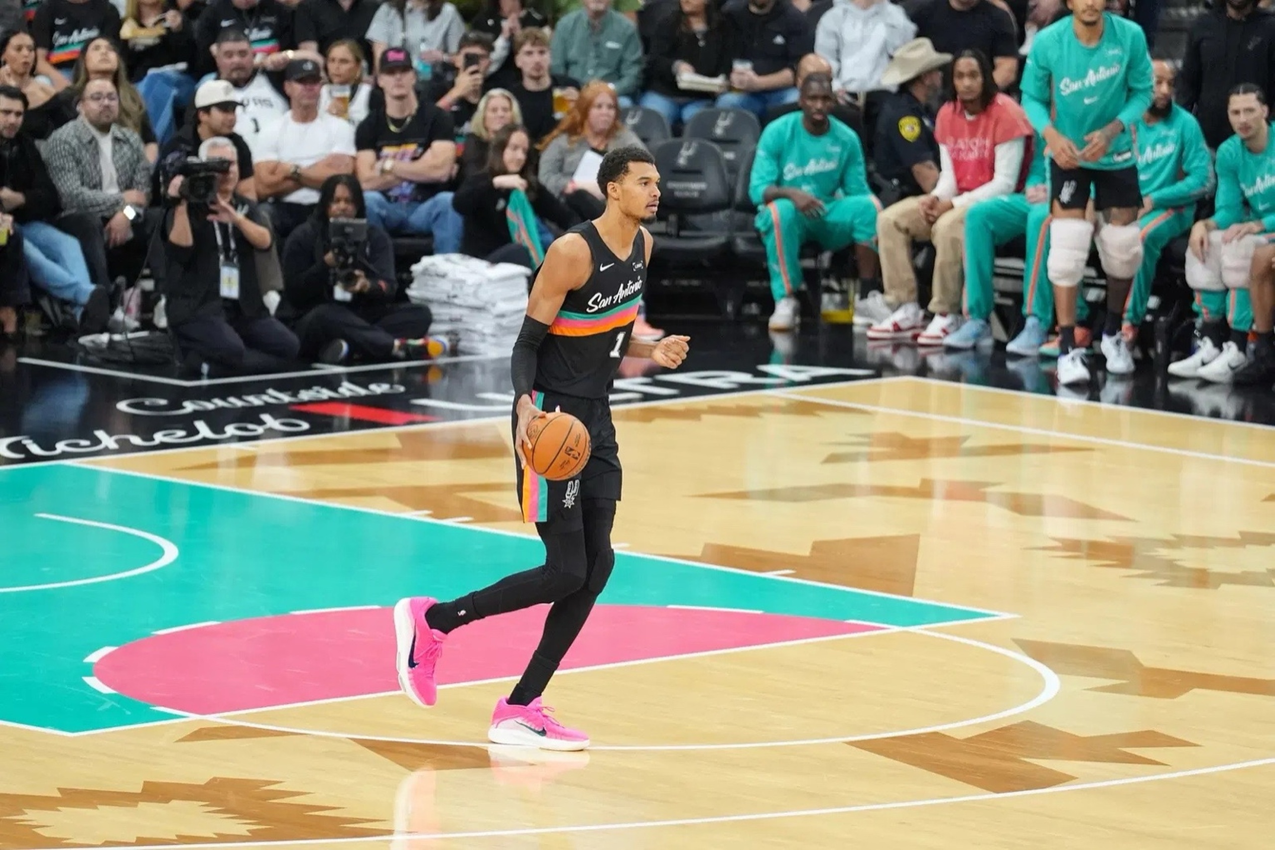 Jan 7, 2026; San Antonio, Texas, USA; San Antonio Spurs forward/center Victor Wembanyama (1) dribbles up the court in the second half against the Los Angeles Lakers at Frost Bank Center. Mandatory Credit: Daniel Dunn-Imagn Images