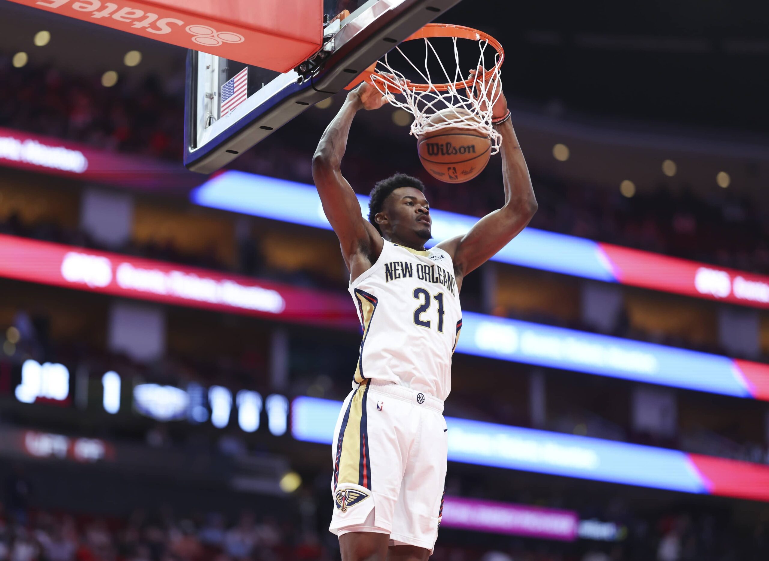 Mar 8, 2025; Houston, Texas, USA; New Orleans Pelicans center Yves Missi (21) dunks the ball during the first quarter against the Houston Rockets at Toyota Center. Mandatory Credit: Troy Taormina-Imagn Images