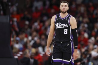 Sacramento Kings guard Zach LaVine (8) walks on the court during the first half at United Center.