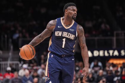 New Orleans Pelicans forward Zion Williamson (1) controls the ball against the Atlanta Hawks during the first half at State Farm Arena.