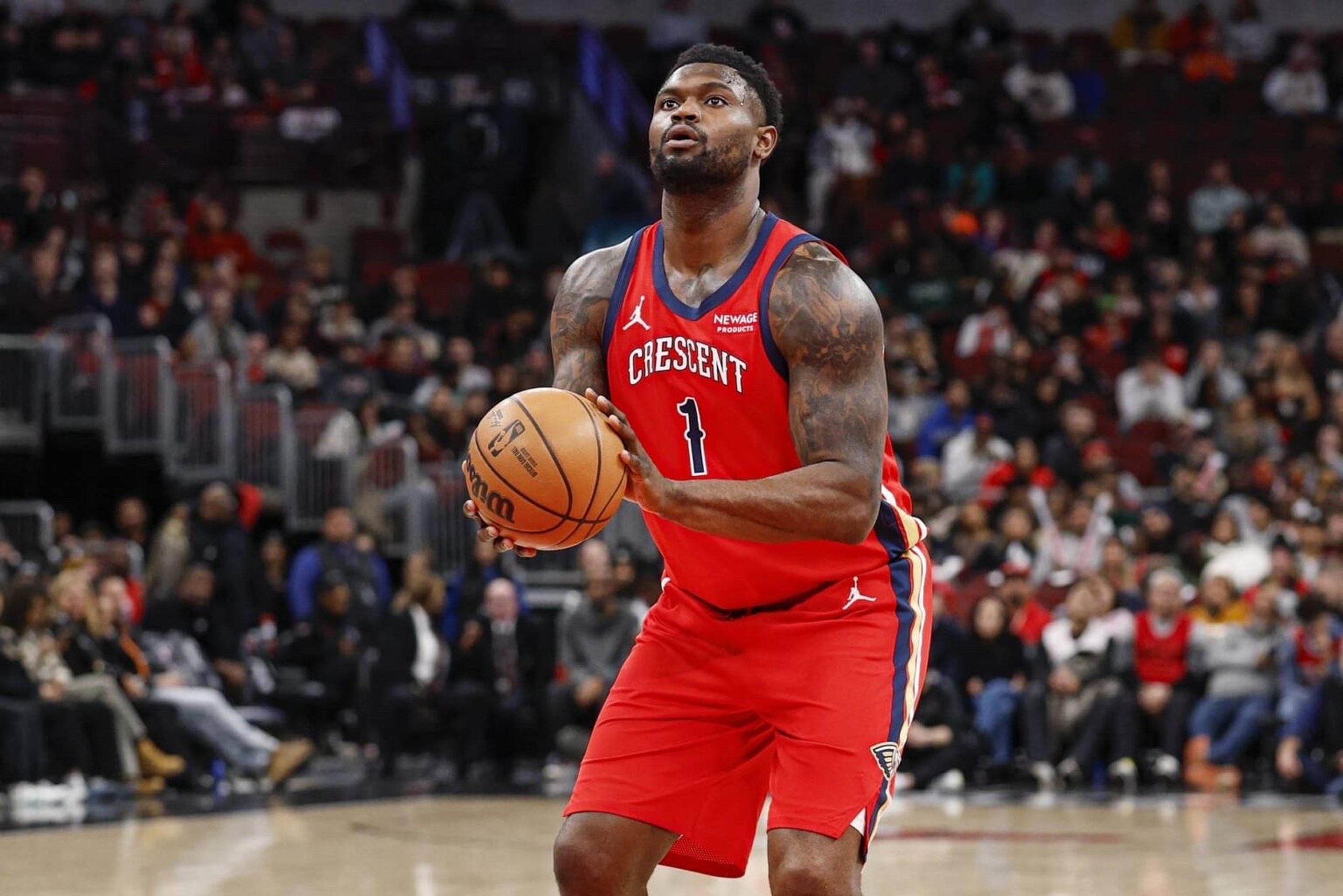 Dec 14, 2025; Chicago, Illinois, USA; New Orleans Pelicans forward Zion Williamson (1) shoots a free throw against the Chicago Bulls during the second half at United Center. Mandatory Credit: Kamil Krzaczynski-Imagn Images