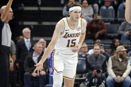 Memphis, Tennessee, USA; Los Angeles Lakers guard Austin Reaves (15) reacts during the third quarter against the Memphis Grizzlies at FedExForum. Mandatory Credit: Petre Thomas-Imagn Images