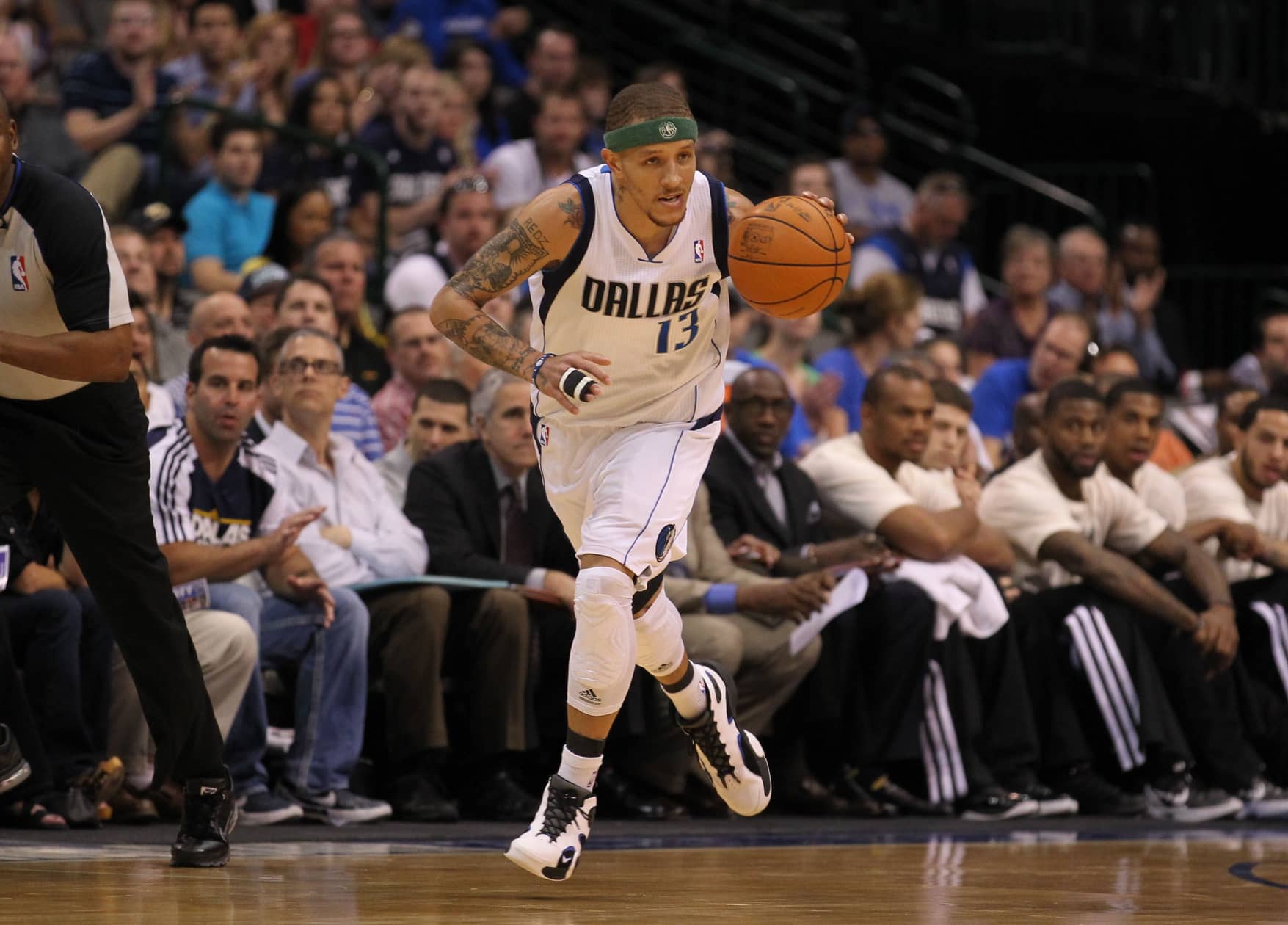 Dallas, TX, USA; Dallas Mavericks guard Delonte West (13) leads a fast break in the first quarter against Sacramento Kings forward Donte' Greene (20) at American Airlines Center. Mandatory Credit: Matthew Emmons-Imagn Images