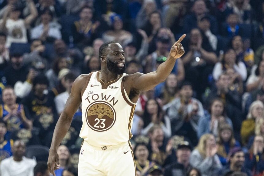 San Francisco, California, USA; Golden State Warriors forward Draymond Green (23) reacts after hitting a three-point shot against the Charlotte Hornets during the first quarter at Chase Center. Mandatory Credit: John Hefti-Imagn Images