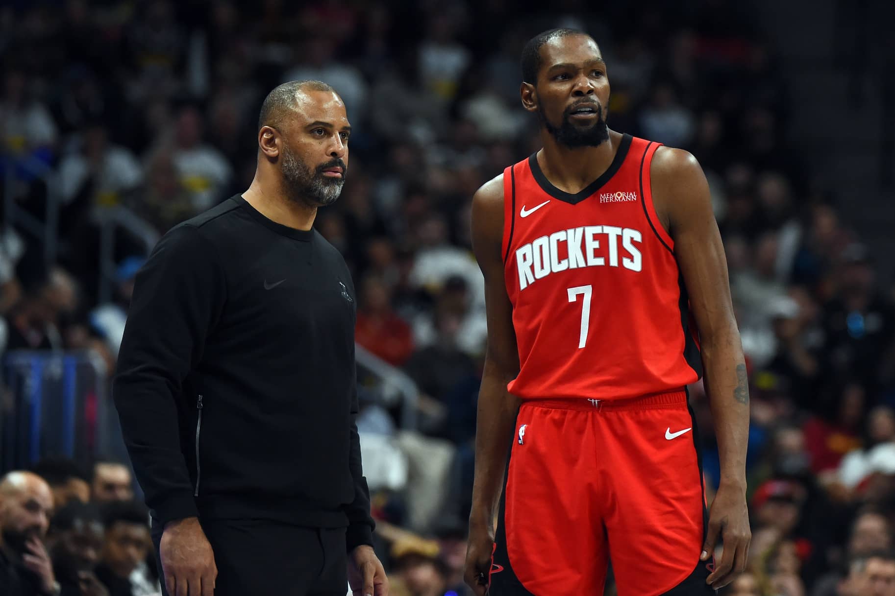 Denver, Colorado, USA; Houston Rockets forward Kevin Durant (7) talks with head coach Ime Udoka during the second half against the Denver Nuggets at Ball Arena. Mandatory Credit: Christopher Hanewinckel-Imagn Images