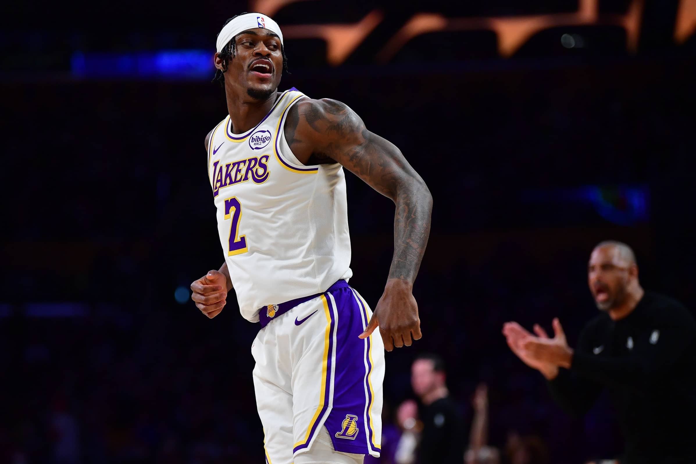 Los Angeles, California, USA; Los Angeles Lakers forward Jarred Vanderbilt (2) reacts after scoring a three point basket against the Houston Rockets during the first half at Crypto.com Arena. Mandatory Credit: Gary A. Vasquez-Imagn Images