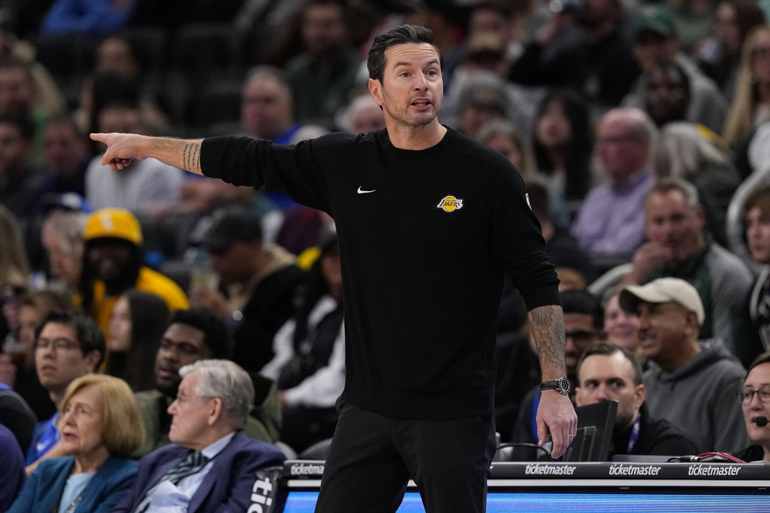 Milwaukee, Wisconsin, USA; Los Angeles Lakers head coach JJ Redick gestures during the first quarter against the Milwaukee Bucks at Fiserv Forum. Mandatory Credit: Jeff Hanisch-Imagn Images