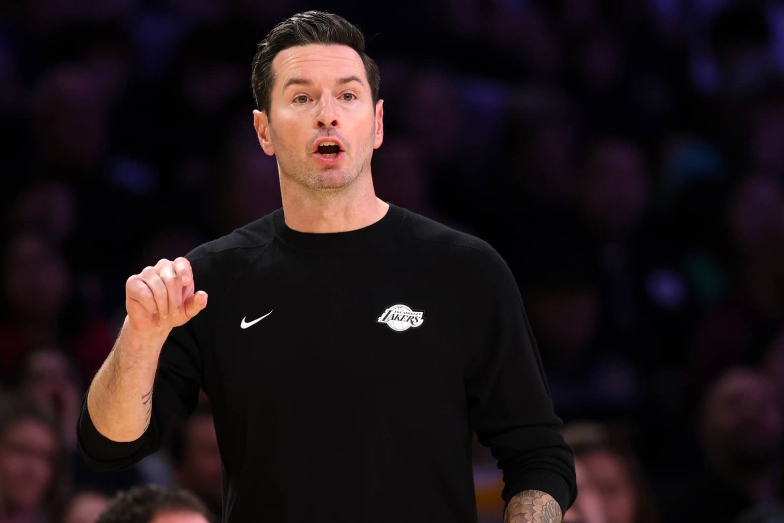 Los Angeles, California, USA; Los Angeles Lakers Head Coach JJ Redick reacts to a play during the fourth quarter against the Memphis Grizzlies at Crypto.com Arena. Mandatory Credit: Kiyoshi Mio-Imagn Images