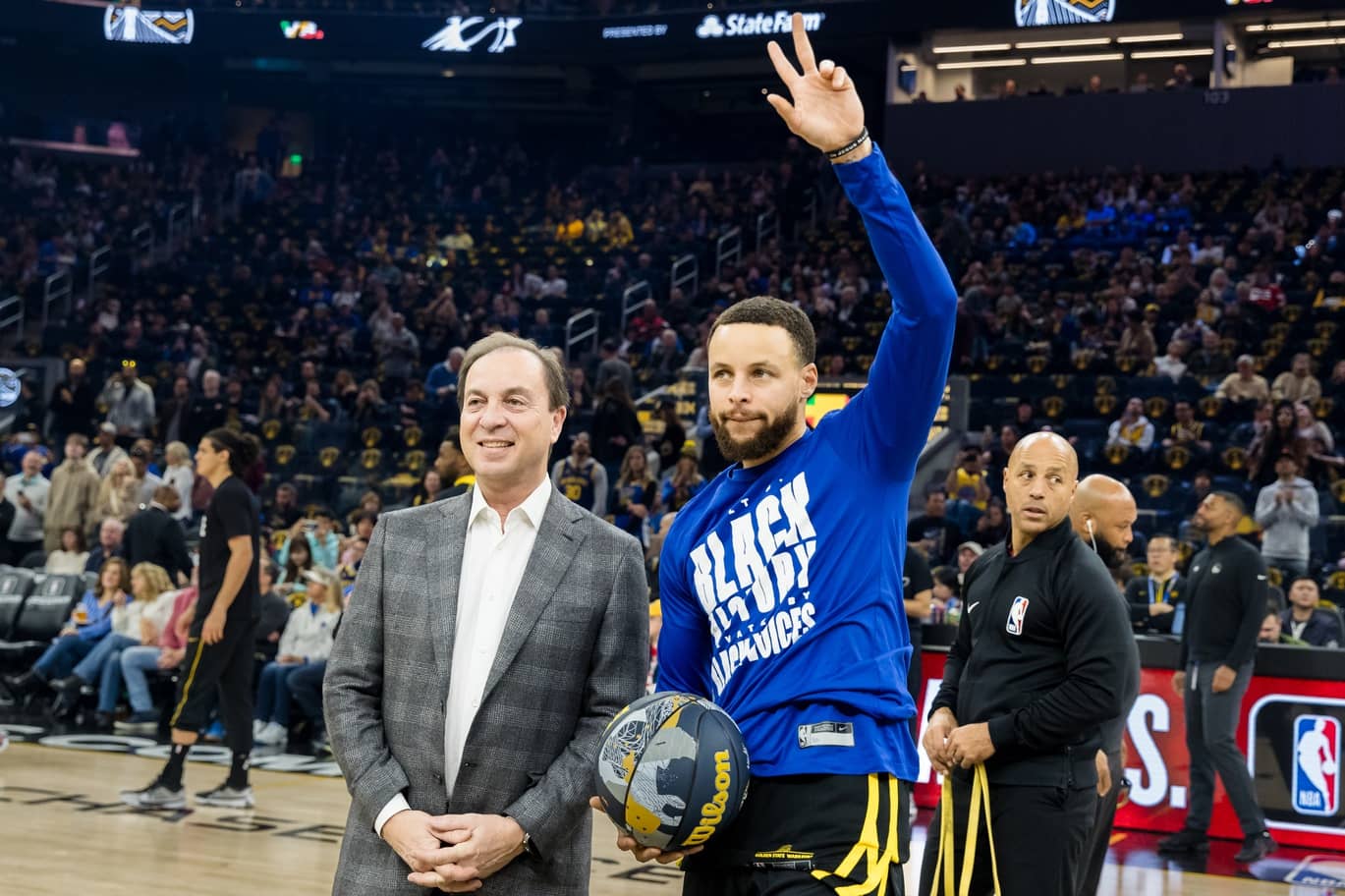 San Francisco, California, USA; Golden State Warriors CEO Joe Lacob presents guard Stephen Curry (30) with the 2024 NBA All-Star ball before the game against the Phoenix Suns at Chase Center. Mandatory Credit: John Hefti-Imagn Images