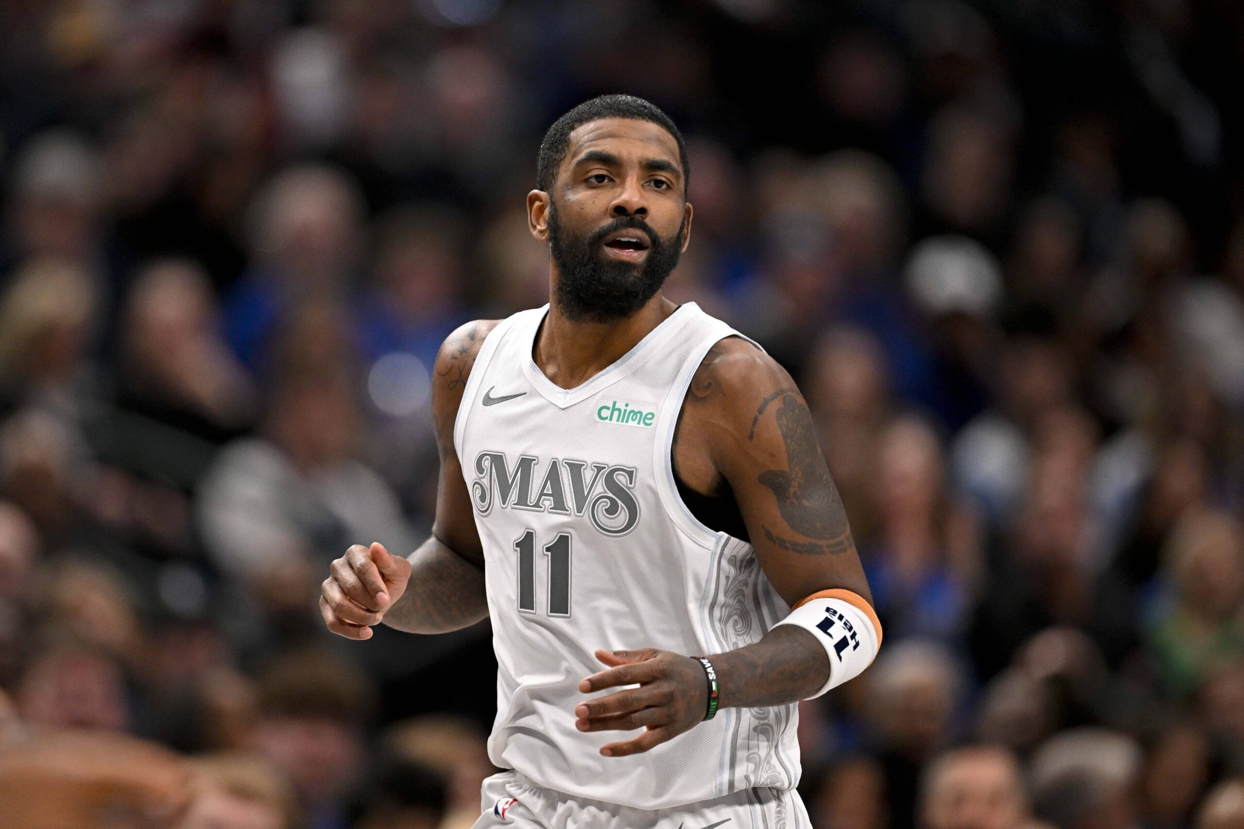 Dallas, Texas, USA; Dallas Mavericks guard Kyrie Irving (11) runs back up the court during the second half against the Minnesota Timberwolves at the American Airlines Center. Mandatory Credit: Jerome Miron-Imagn Images
