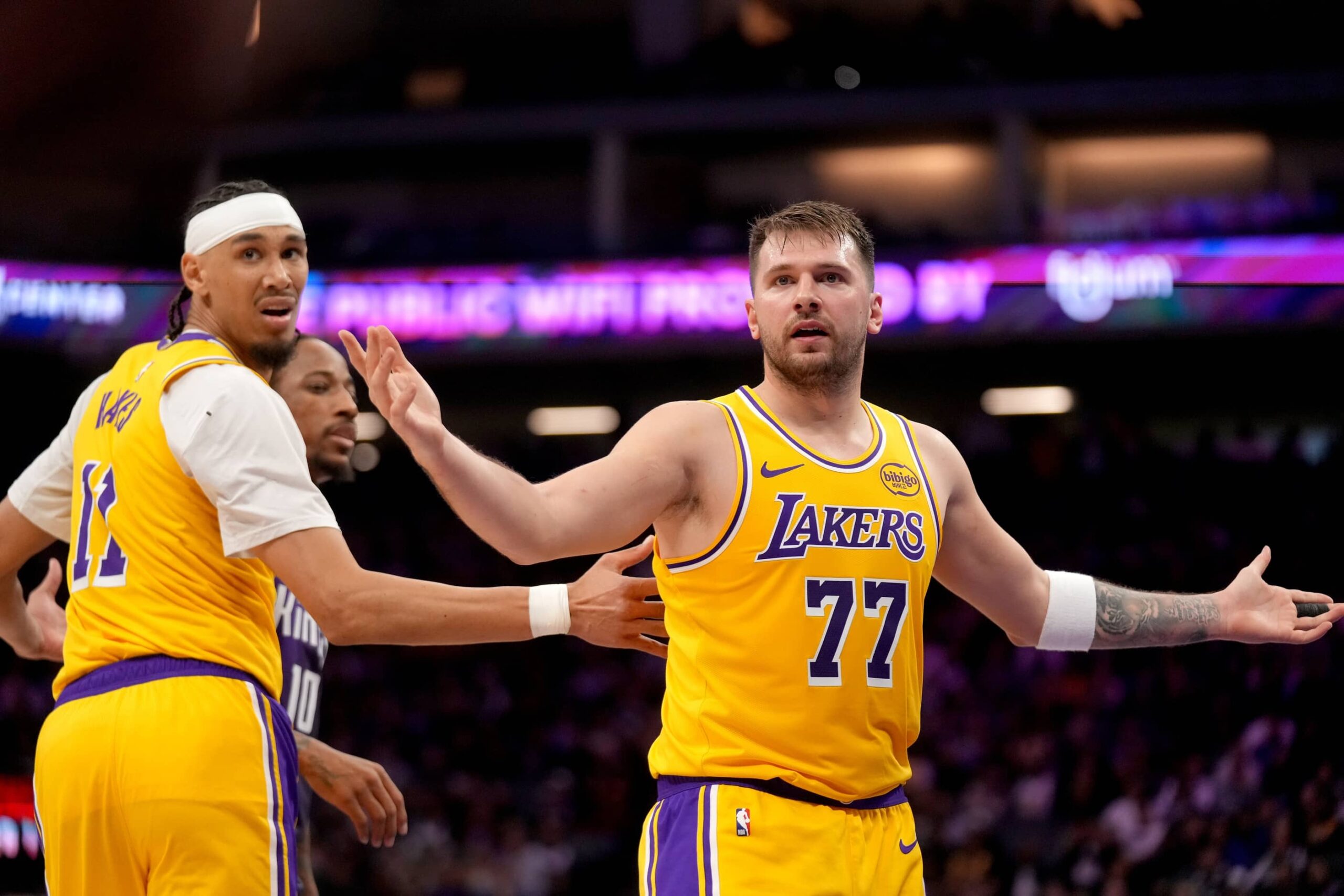 Sacramento, California, USA; Los Angeles Lakers guard Luka Doncic (77) looks towards an official after scoring a basket against the Sacramento Kings in the second quarter at the Golden 1 Center. Mandatory Credit: Cary Edmondson-Imagn Images