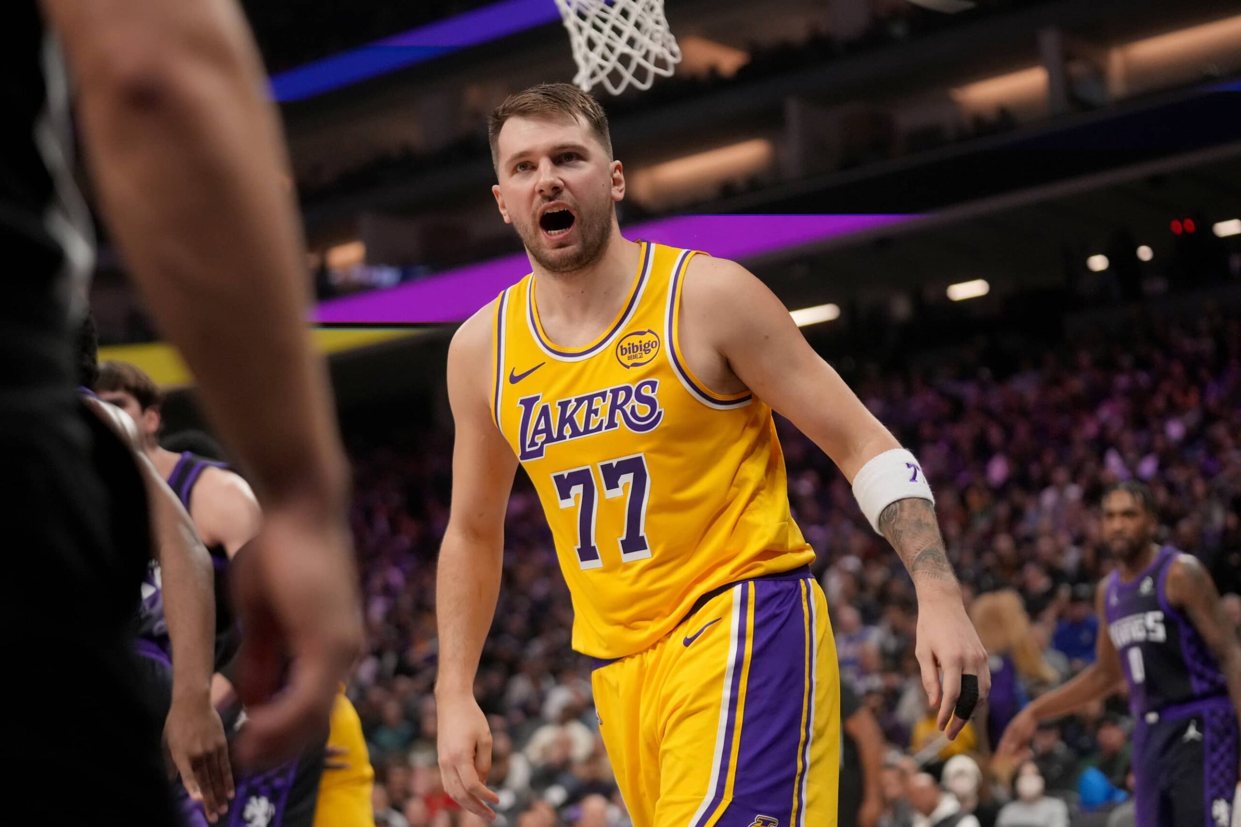 Sacramento, California, USA; Los Angeles Lakers guard Luka Doncic (77) reacts after committing a turnover against the Sacramento Kings in the second quarter at the Golden 1 Center. Mandatory Credit: Cary Edmondson-Imagn Images