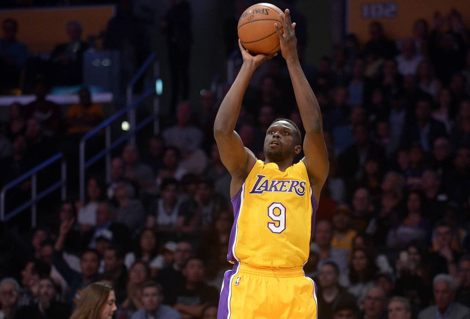Los Angeles, CA, USA; Los Angeles Lakers forward Luol Deng (9) shoots against the San Antonio Spurs during the first half at Staples Center. Mandatory Credit: Gary A. Vasquez-Imagn Images