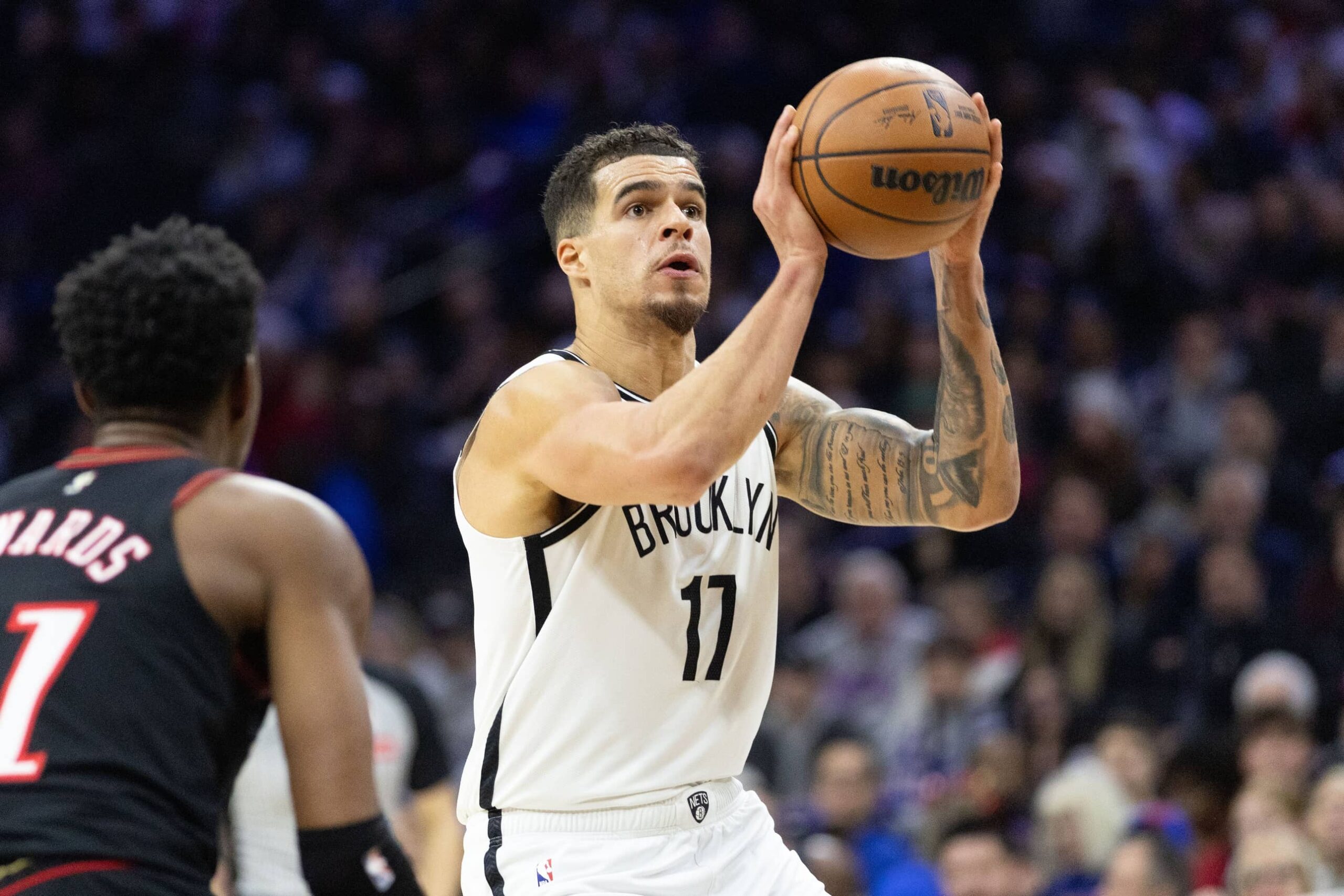 Philadelphia, Pennsylvania, USA; Brooklyn Nets forward Michael Porter Jr. (17) shoots against the Philadelphia 76ers during the second quarter at Xfinity Mobile Arena. Mandatory Credit: Bill Streicher-Imagn Images