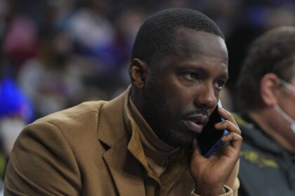 Philadelphia, Pennsylvania, USA; NBA agent Rich Paul talks on the phone prior to the game between the Charlotte Hornets and Philadelphia 76ers at the Wells Fargo Center. Mandatory Credit: Mitchell Leff-Imagn Images
