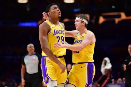 Los Angeles, California, USA; Los Angeles Lakers forward Rui Hachimura (28) reacts with guard Austin Reaves (15) after scoring a basket and drawing the foul against the Miami Heat during the second half at Crypto.com Arena. Mandatory Credit: Gary A. Vasquez-Imagn Images