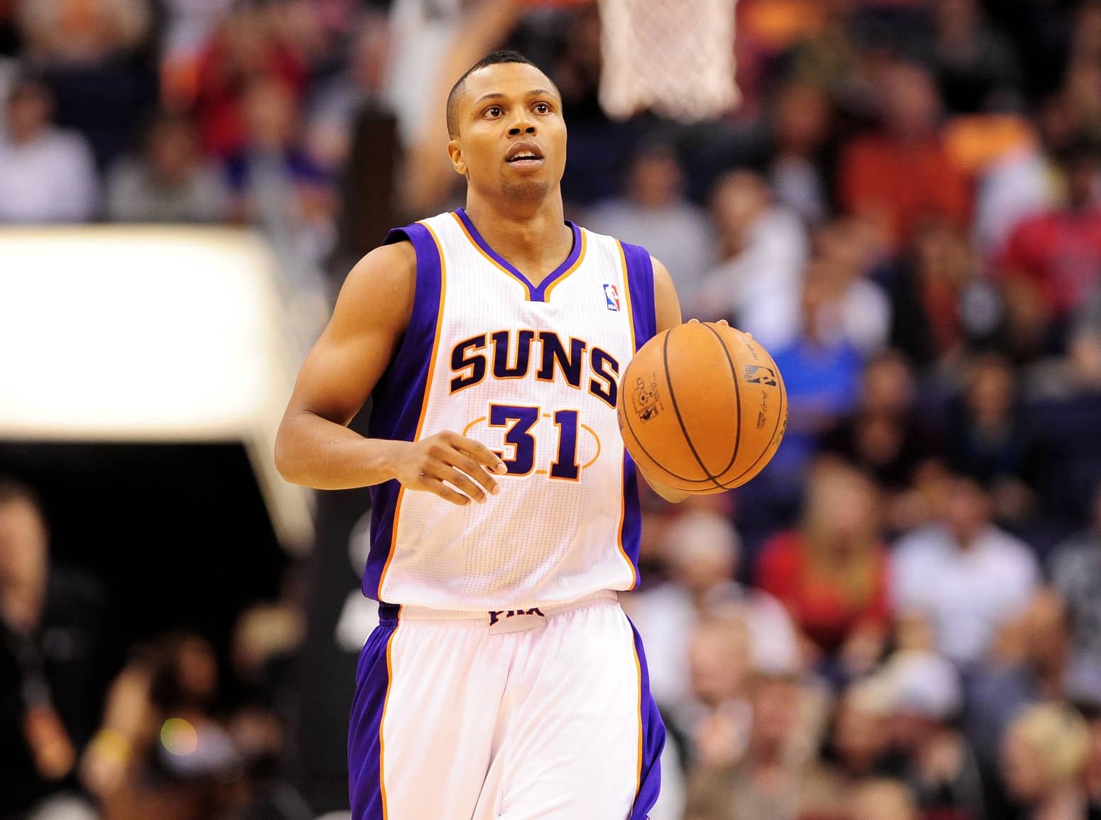 Phoenix, AZ, USA; Phoenix Suns guard Sebastian Telfair (31) dribbles the ball up the court during the game against the Chicago Bulls at the US Airways Center. The Bulls defeated the Suns 112-106 in overtime. Mandatory Credit: Jennifer Stewart-Imagn Images