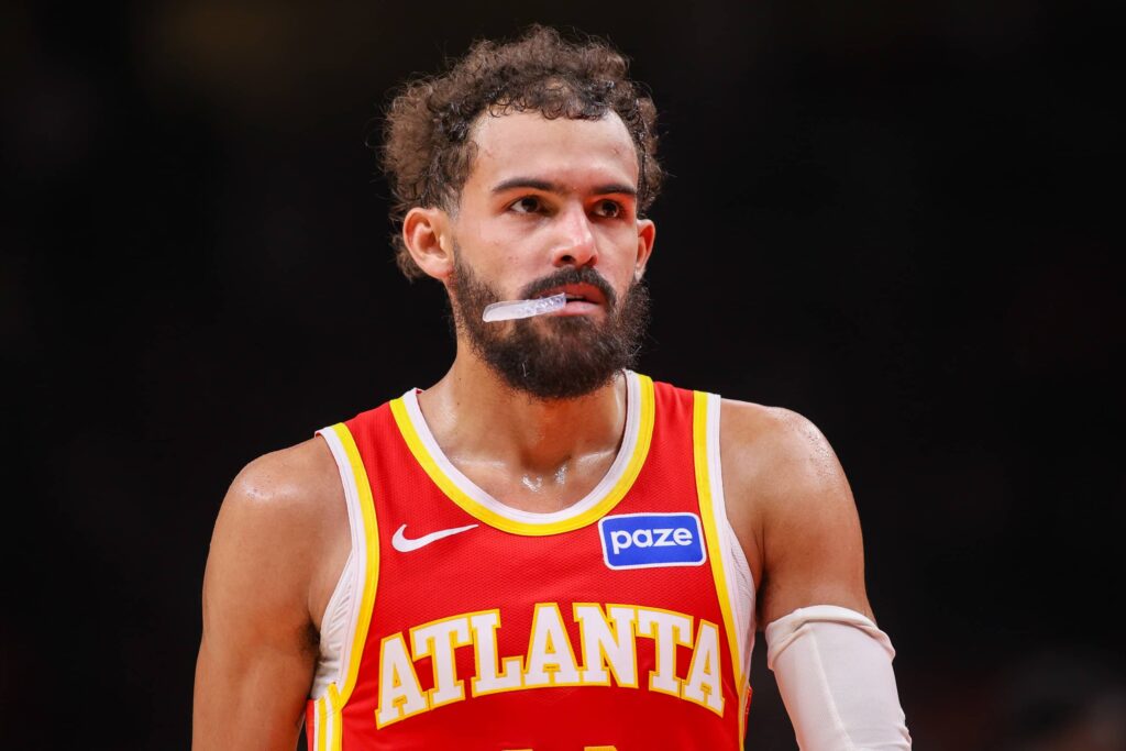 Atlanta, Georgia, USA; Atlanta Hawks guard Trae Young (11) in action against the New York Knicks in the third quarter at State Farm Arena. Mandatory Credit: Brett Davis-Imagn Images