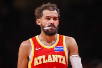 Atlanta, Georgia, USA; Atlanta Hawks guard Trae Young (11) in action against the New York Knicks in the third quarter at State Farm Arena. Mandatory Credit: Brett Davis-Imagn Images
