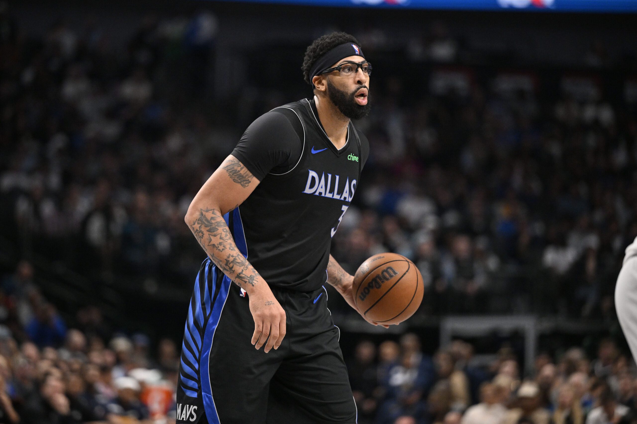 Dec 23, 2025; Dallas, Texas, USA; Dallas Mavericks forward Anthony Davis (3) brings the ball up court against the Denver Nuggets during the second half at the American Airlines Center. Mandatory Credit: Jerome Miron-Imagn Images