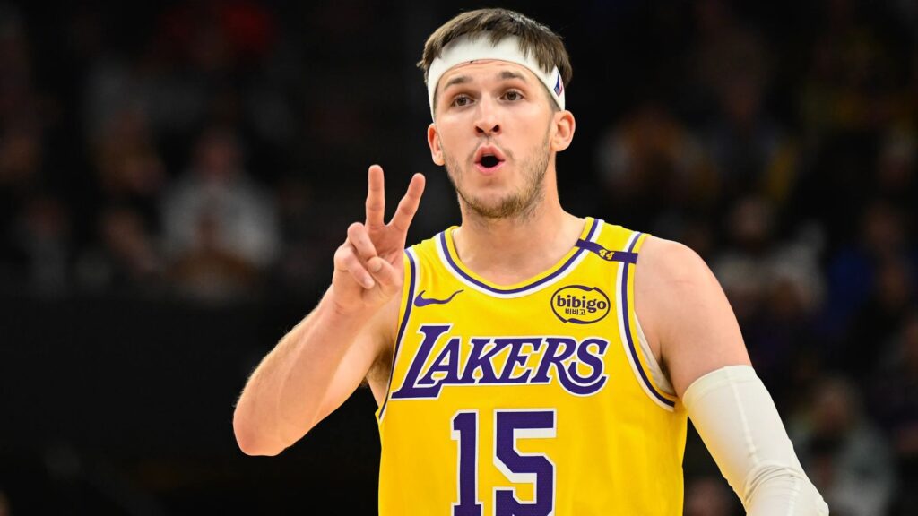 Austin Reaves calls out a play during a Lakers game. Mandatory Credit: Alex Goodlet -GettyImages