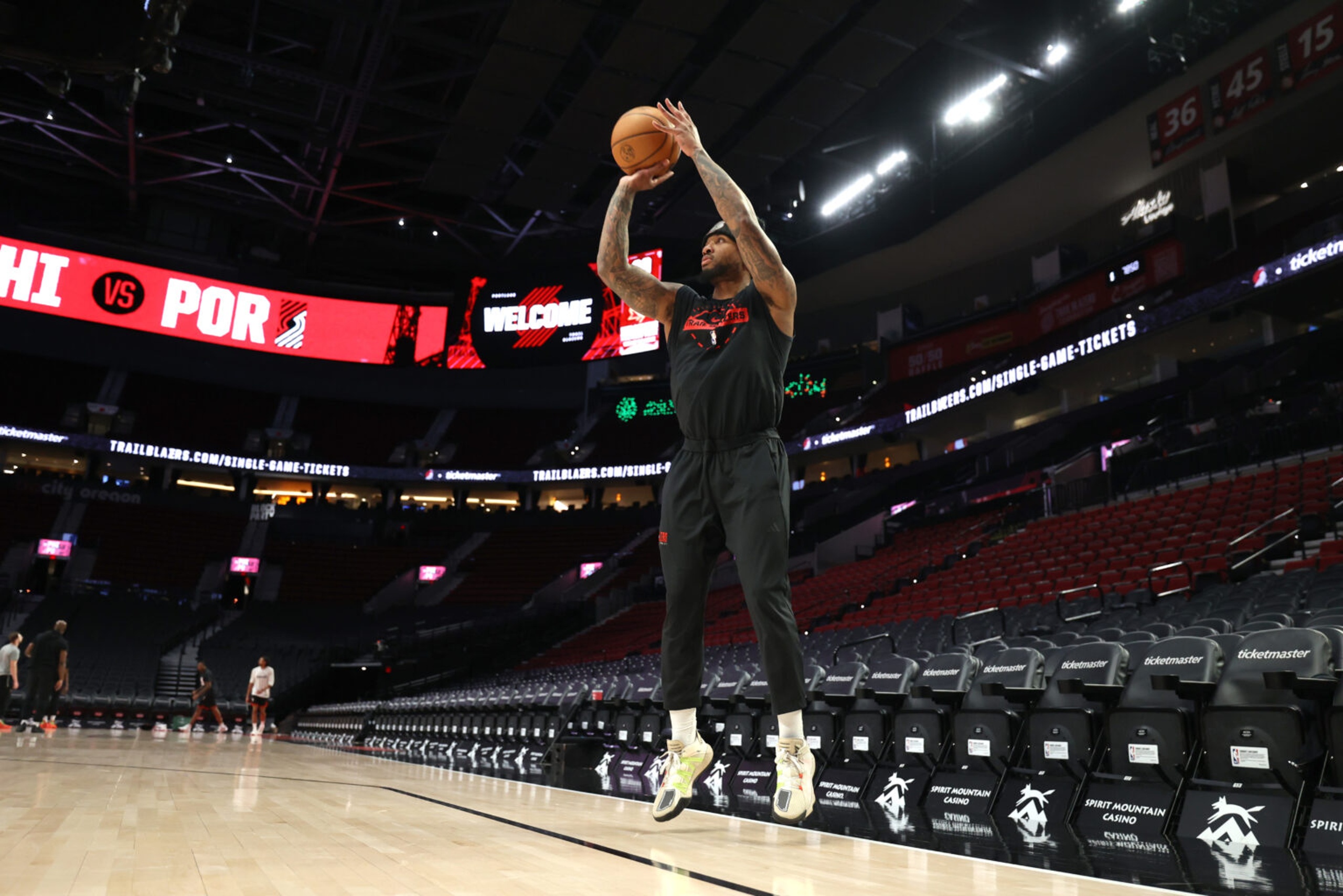 Feb 9, 2026; Portland, Oregon, USA; Portland Trail Blazers guard Damian Lillard (0) shoots a three-point shot during warm ups before the Trail Blazers play against the Philadelphia 76ers at Moda Center. Mandatory Credit: Jaime Valdez-Imagn Images