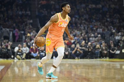 Dec 22, 2025; Cleveland, Ohio, USA; Cleveland Cavaliers forward De'Andre Hunter (12) dribbles the ball in the first quarter against the Charlotte Hornets at Rocket Arena. Mandatory Credit: David Richard-Imagn Images