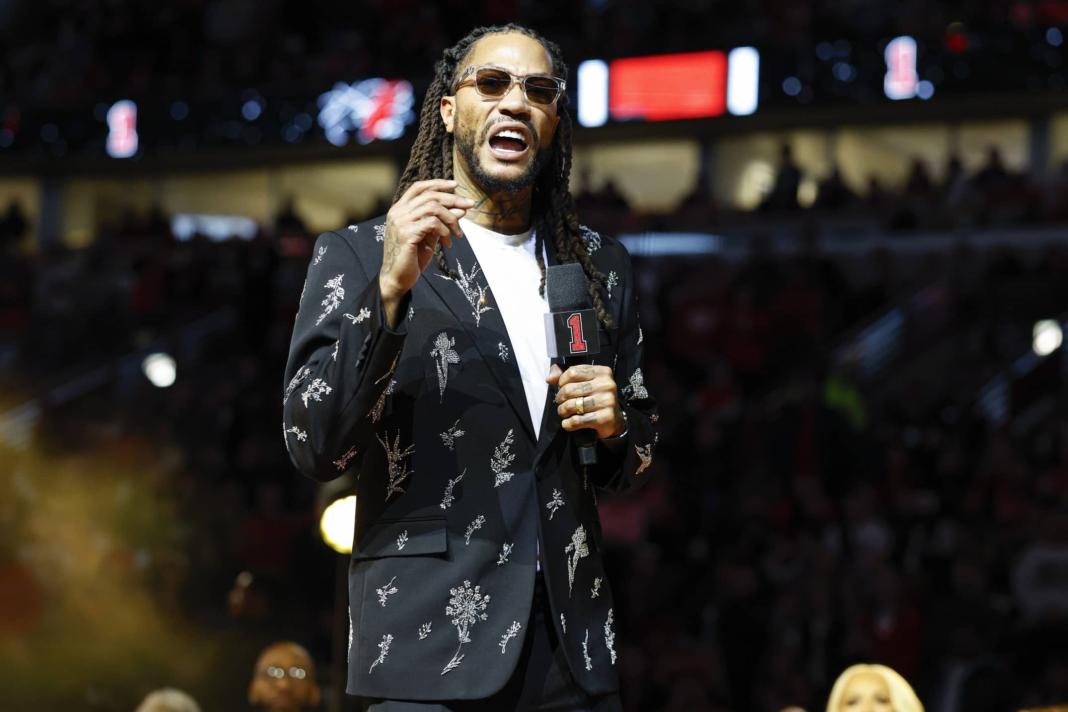 Derrick Rose speaks during his jersey retirement ceremony after an NBA game between the Chicago Bulls and Boston Celtics at United Center.