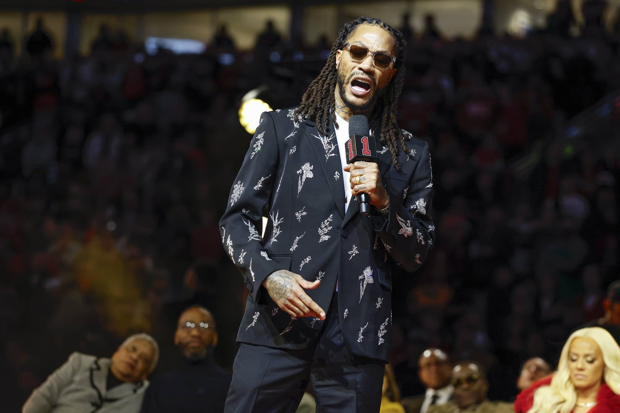 Derrick Rose speaks during his jersey retirement ceremony after an NBA game between the Chicago Bulls and Boston Celtics at United Center.