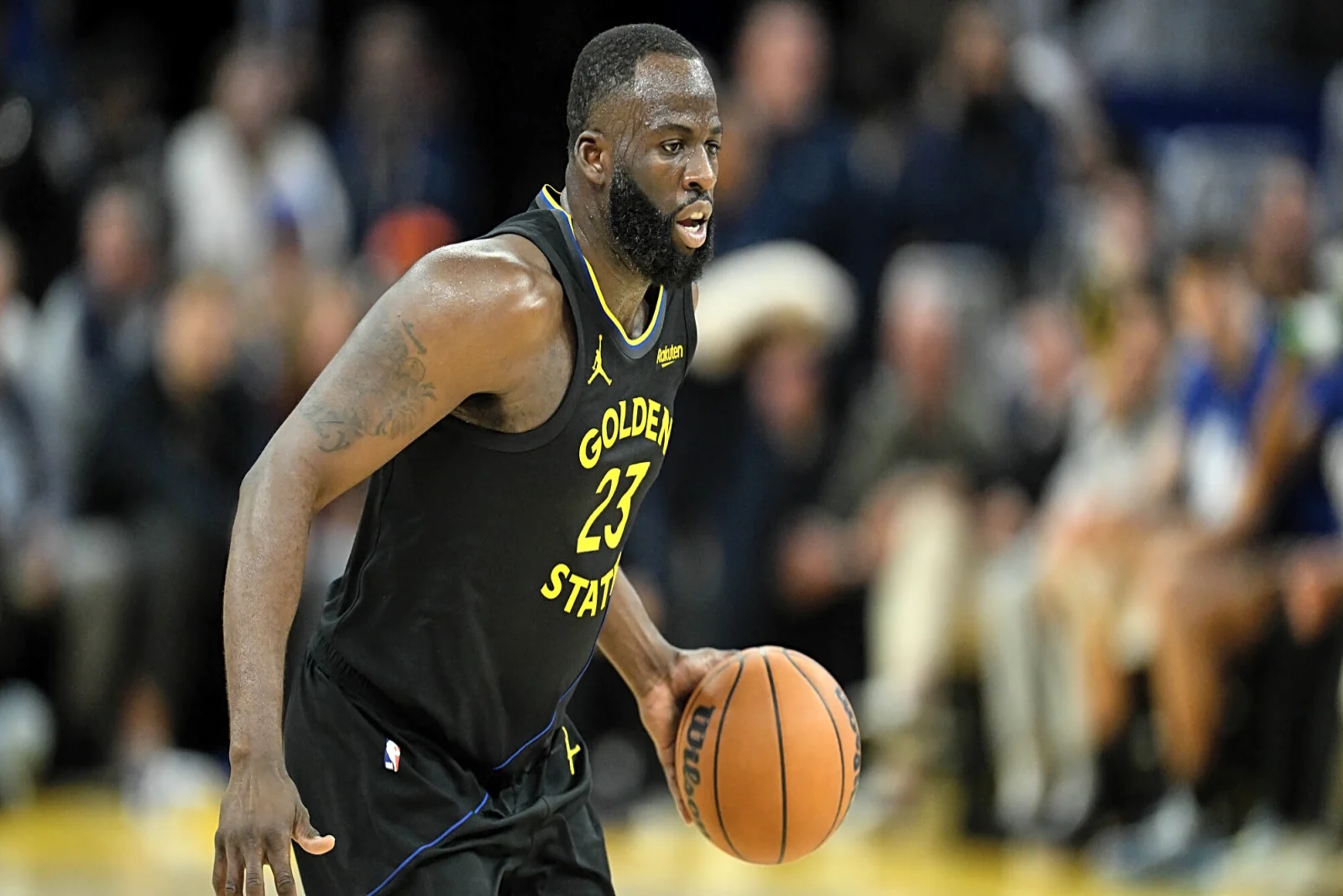 Feb 11, 2026; San Francisco, California, USA; Golden State Warriors forward Draymond Green (23) dribbles against the San Antonio Spurs in the third quarter at Chase Center. Mandatory Credit: Eakin Howard-Imagn Images