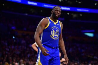 Feb 7, 2026; Los Angeles, California, USA; Golden State Warriors forward Draymond Green (23) reacts during the first half at Crypto.com Arena. Mandatory Credit: Gary A. Vasquez-Imagn Images