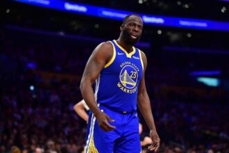 Golden State Warriors forward Draymond Green (23) reacts during the first half at Crypto.com Arena. Mandatory Credit: Gary A. Vasquez-Imagn Images