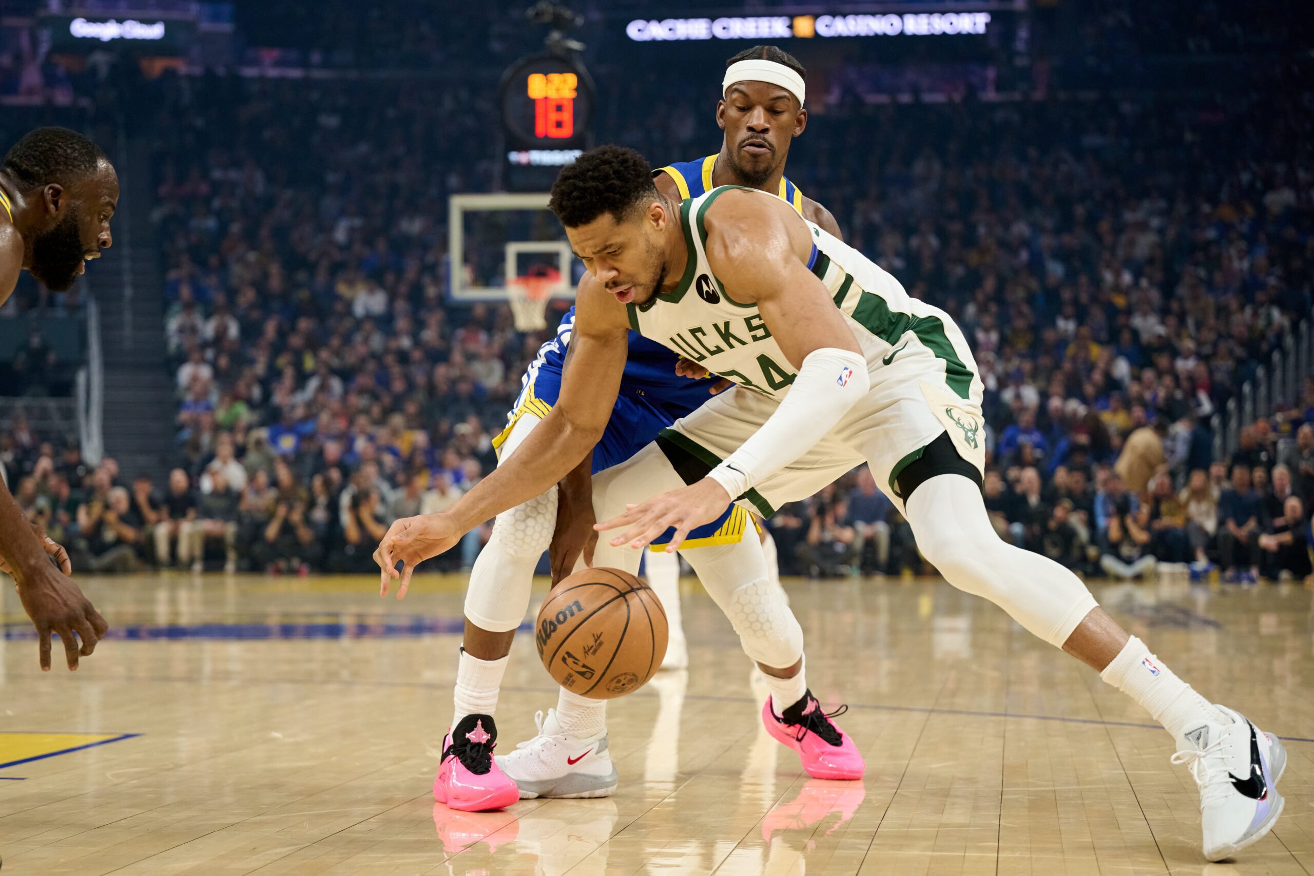 Jan 7, 2026; San Francisco, California, USA; Milwaukee Bucks forward Giannis Antetokounmpo (34) dribbles the ball against Golden State Warriors forward Jimmy Butler III (10) during the first quarter at Chase Center. Mandatory Credit: Robert Edwards-Imagn Images