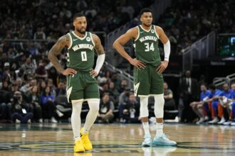 Mar 24, 2024; Milwaukee, Wisconsin, USA; Milwaukee Bucks forward Giannis Antetokounmpo (34) and guard Damian Lillard (0) during the game against the Oklahoma City Thunder at Fiserv Forum. Mandatory Credit: Jeff Hanisch-Imagn Images