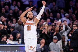 New York, New York, USA; New York Knicks guard Jalen Brunson (11) gestures after the Denver Nuggets call timeout in the second overtime at Madison Square Garden. Mandatory Credit: Wendell Cruz-Imagn Images