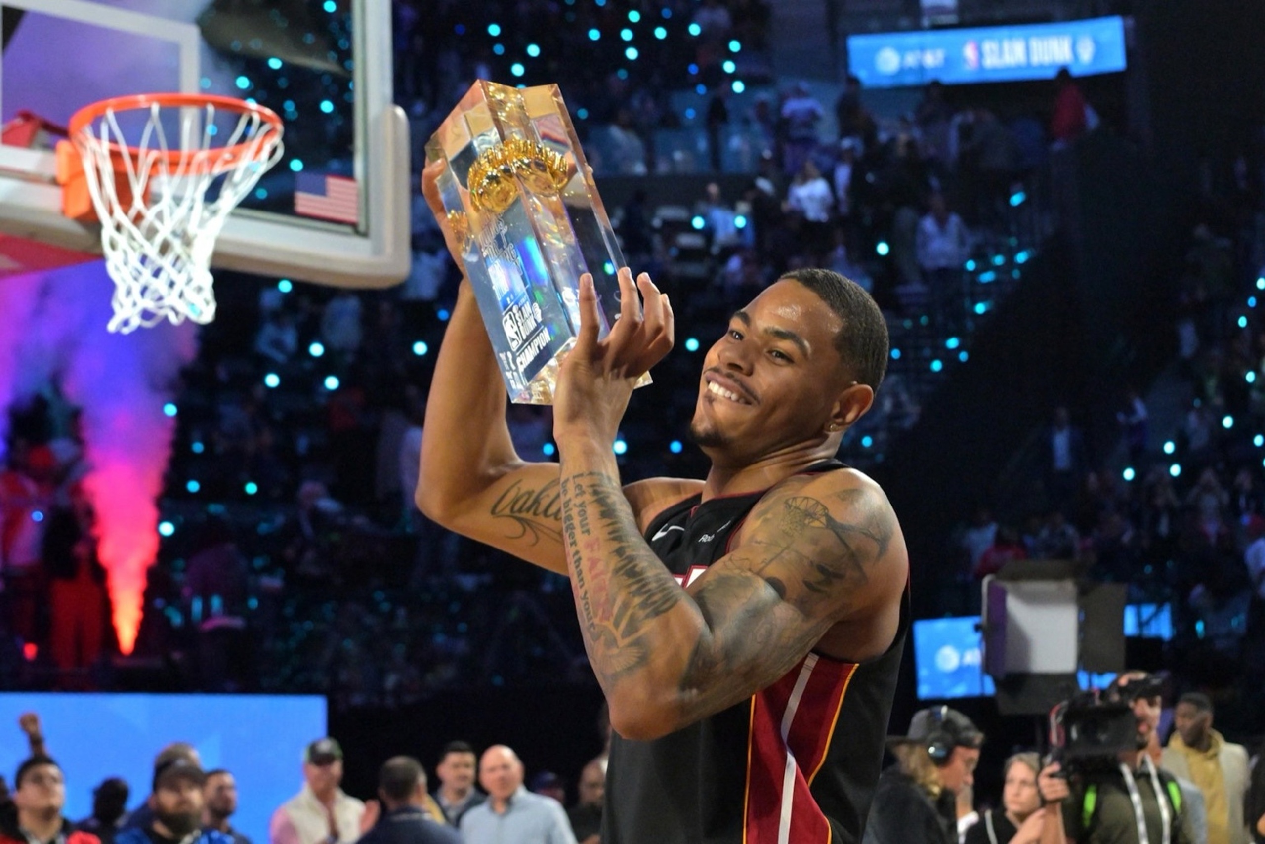 Feb 14, 2026; Los Angeles, CA, USA; Miami Heat forward Keshad Johnson (16) celebrates with the trophy after winning the slam dunk competition during the 2026 NBA All Star Saturday Night at Intuit Dome. Mandatory Credit: Jayne Kamin-Oncea-Imagn Images