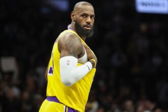 Feb 3, 2026; Brooklyn, New York, USA; Los Angeles Lakers forward LeBron James (23) checks back into the game in the first quarter against the Brooklyn Nets at Barclays Center. Mandatory Credit: Wendell Cruz-Imagn Images